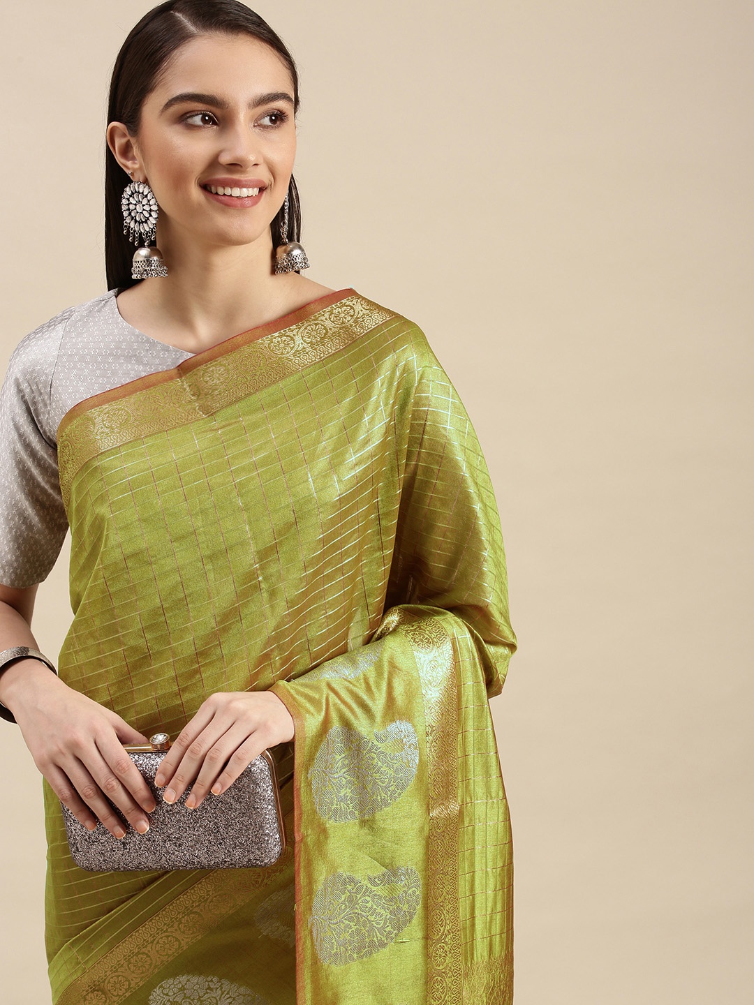 

Royal Rajgharana Saree Green Checked Woven Zari Linen Blend Celebrity Banarasi Saree