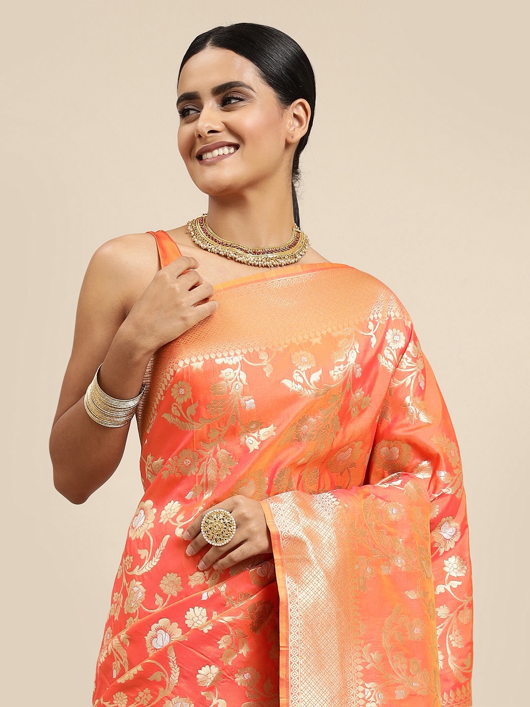

Royal Rajgharana Saree Orange Woven Design Zari Silk Blend Banarasi Sarees