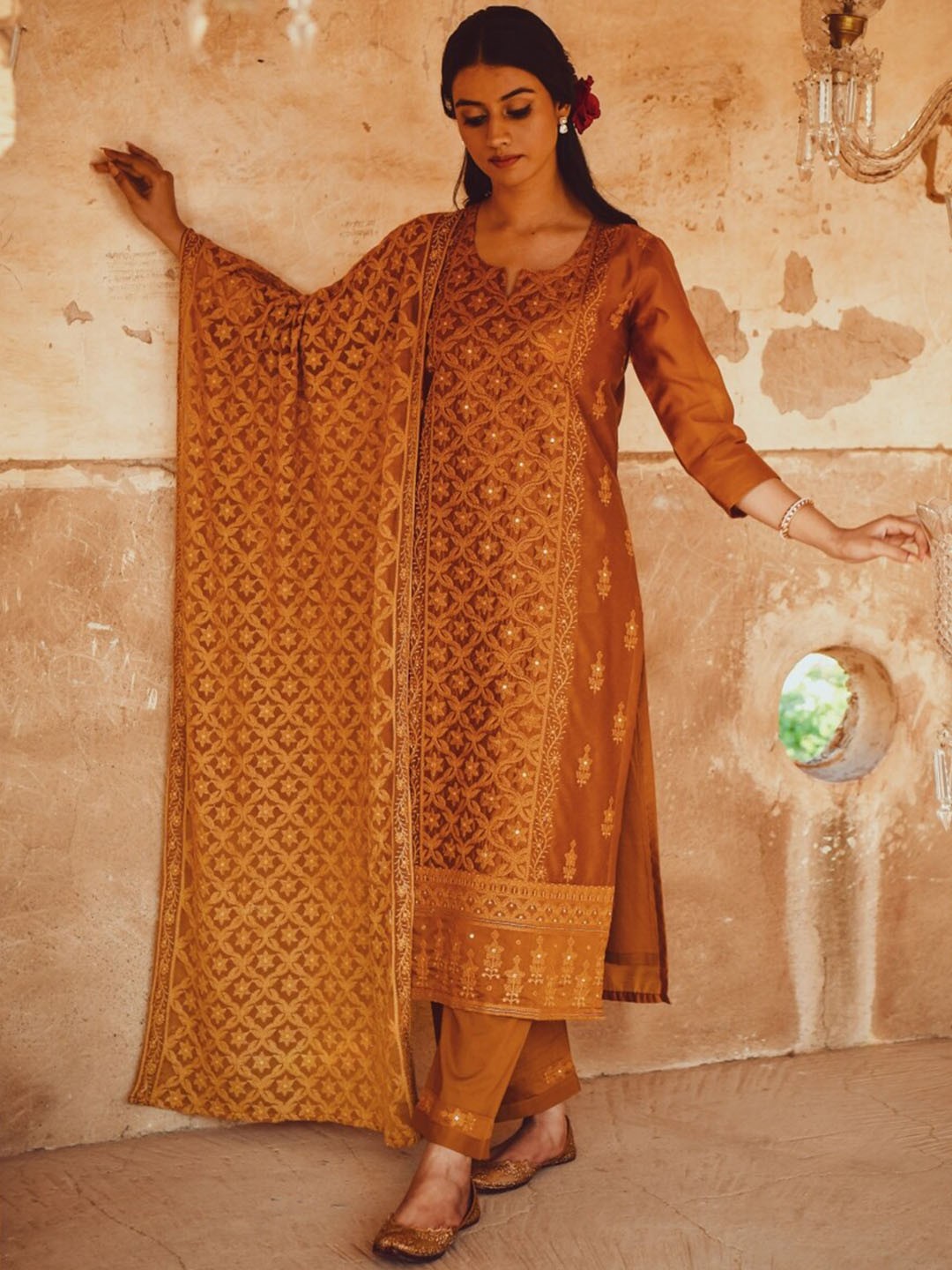

KARAJ JAIPUR Women Mustard Yellow Floral Embroidered Chikankari Kurta with Trousers Set