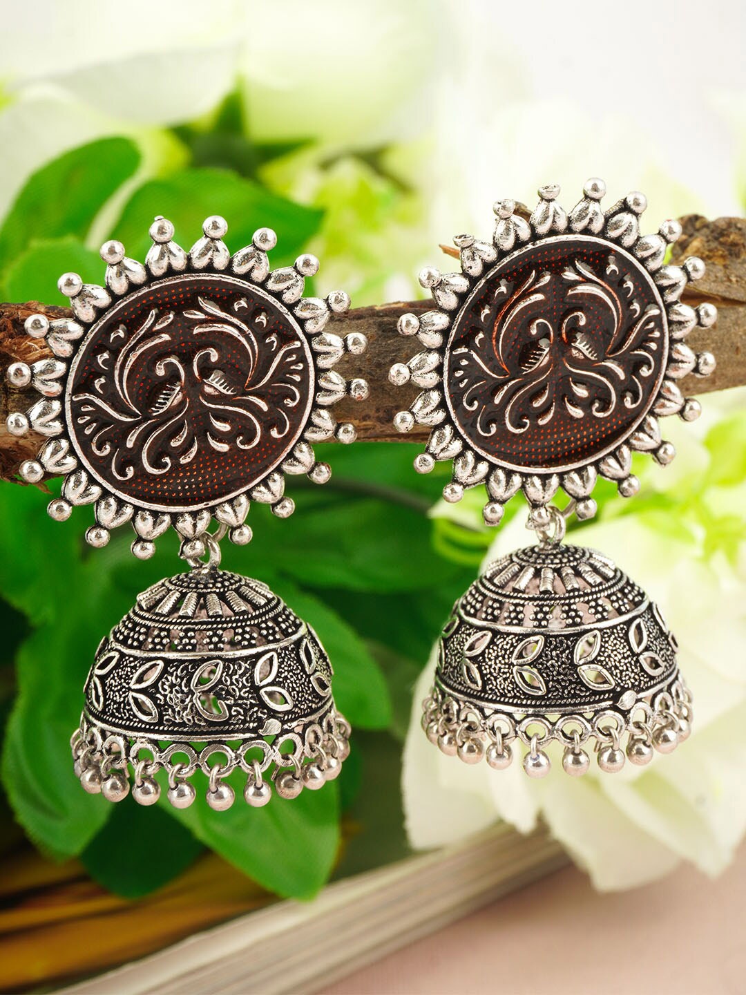 

Urmika Red & Silver-Toned Classic Jhumkas Earrings