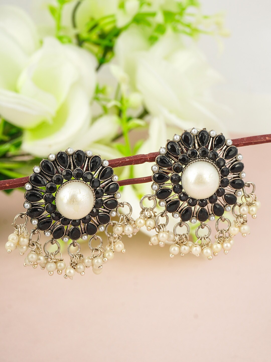 

Urmika Silver-Toned & Black Crystal Pearl Studded Floral Studs