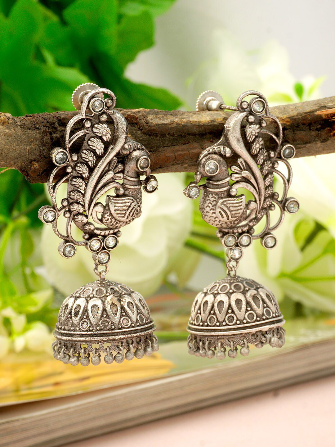

Urmika Silver-Toned Classic Jhumkas Earrings