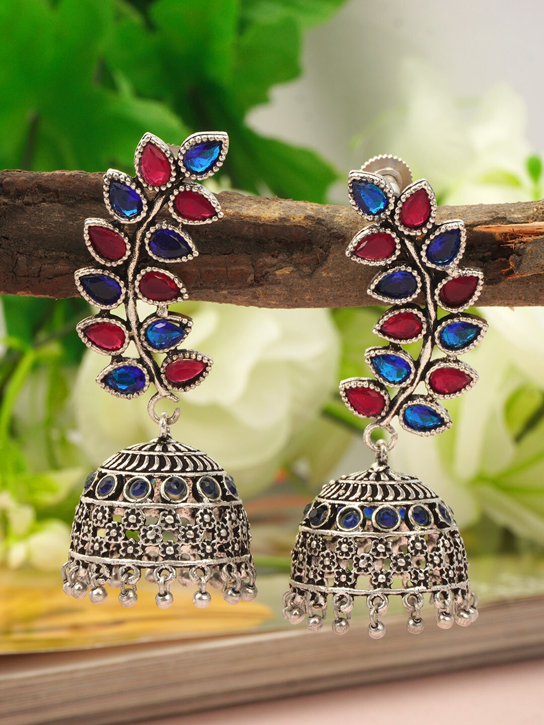 

Urmika Silver-Toned & Blue Dome Shaped Jhumkas Earrings