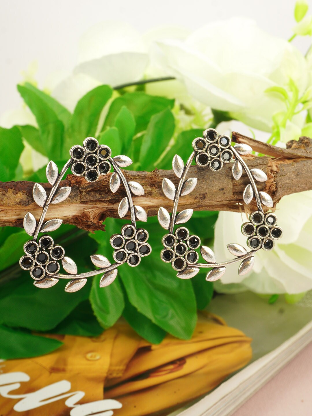 

Urmika Women Black Crystal Leafy Floral Wreath Earrings