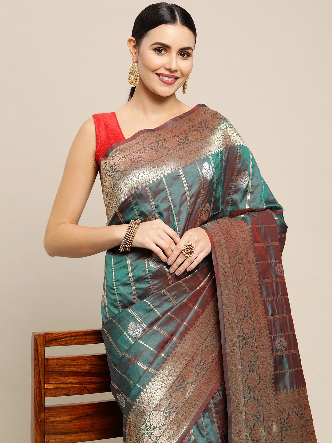 

Royal Rajgharana Saree Teal Green & Gold Ethnic Motifs Zari Celebrity Banarasi Sarees
