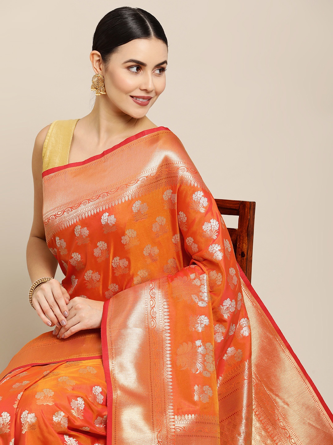 

Royal Rajgharana Saree Orange & Gold Floral Zari Silk Blend Celebrity Banarasi Sarees