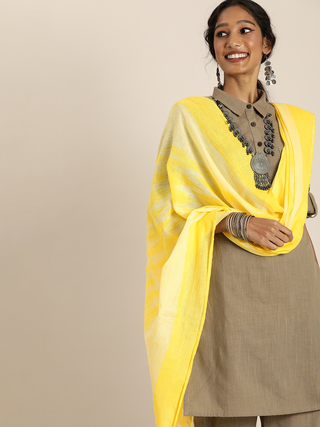 

Taavi Yellow Ethnic Motifs Woven Design Pure Cotton Ikat Dupatta