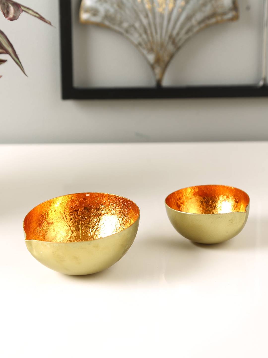 

HomeTown Set Of 2 Orange & Gold-Toned Candle Holders