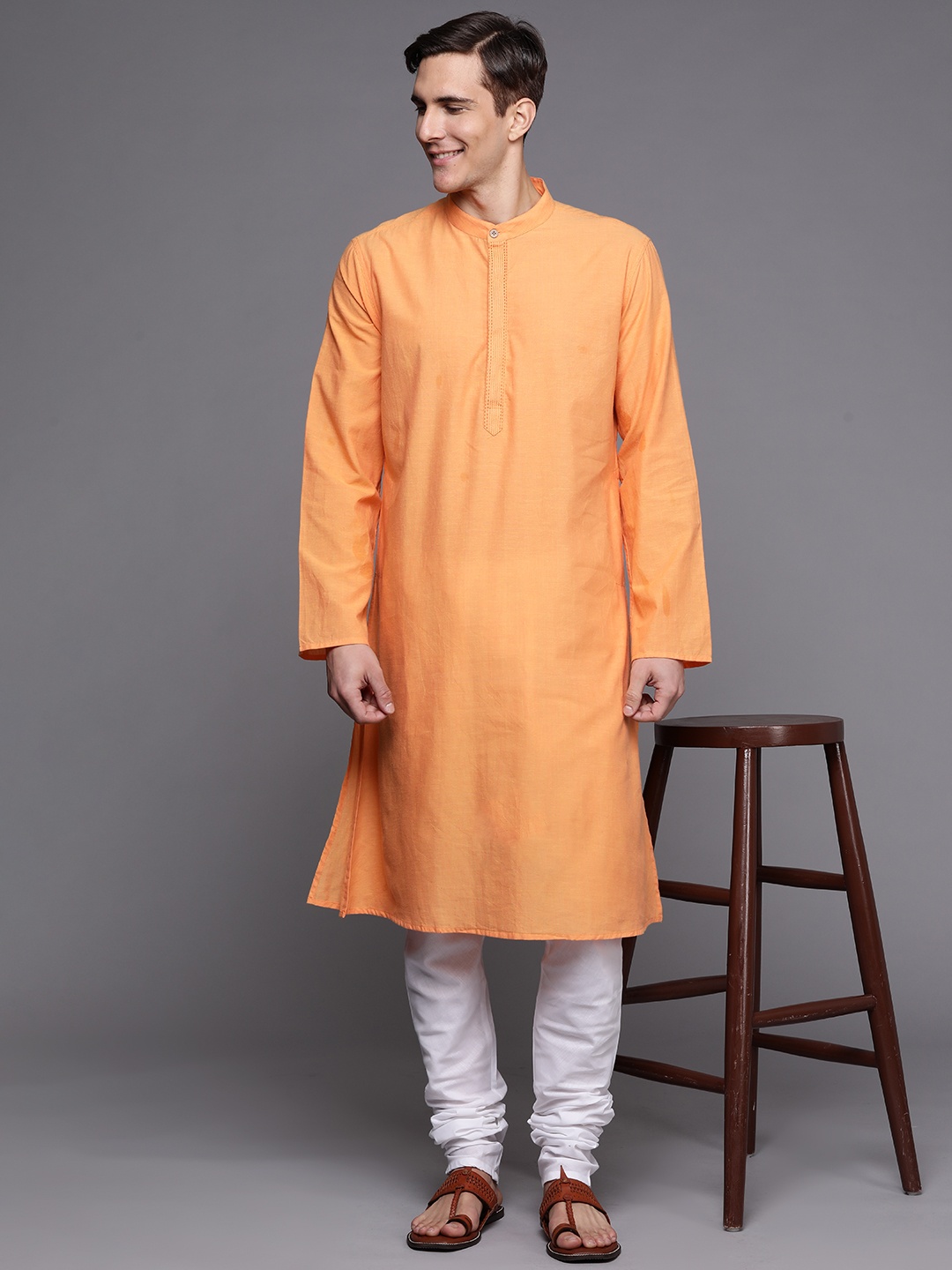 

Fabindia Men Orange Solid Band Collar Pure Cotton Kurta