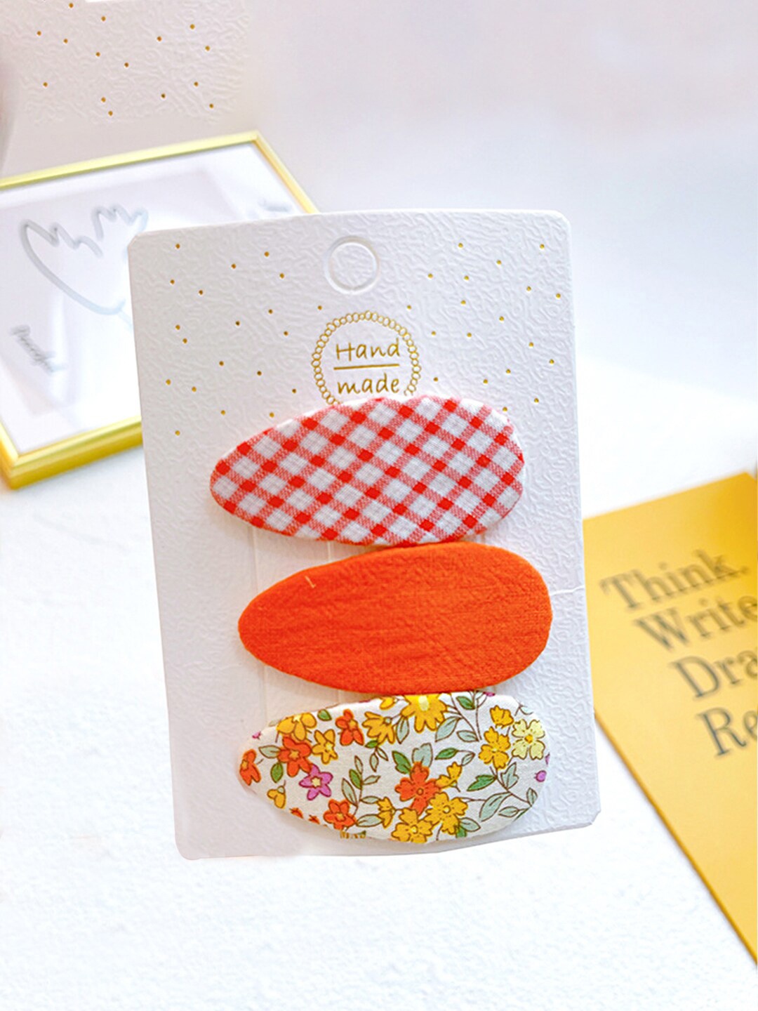 

Yellow Chimes Girls Orange & White Set of 3 Tic Tac Hair Clip