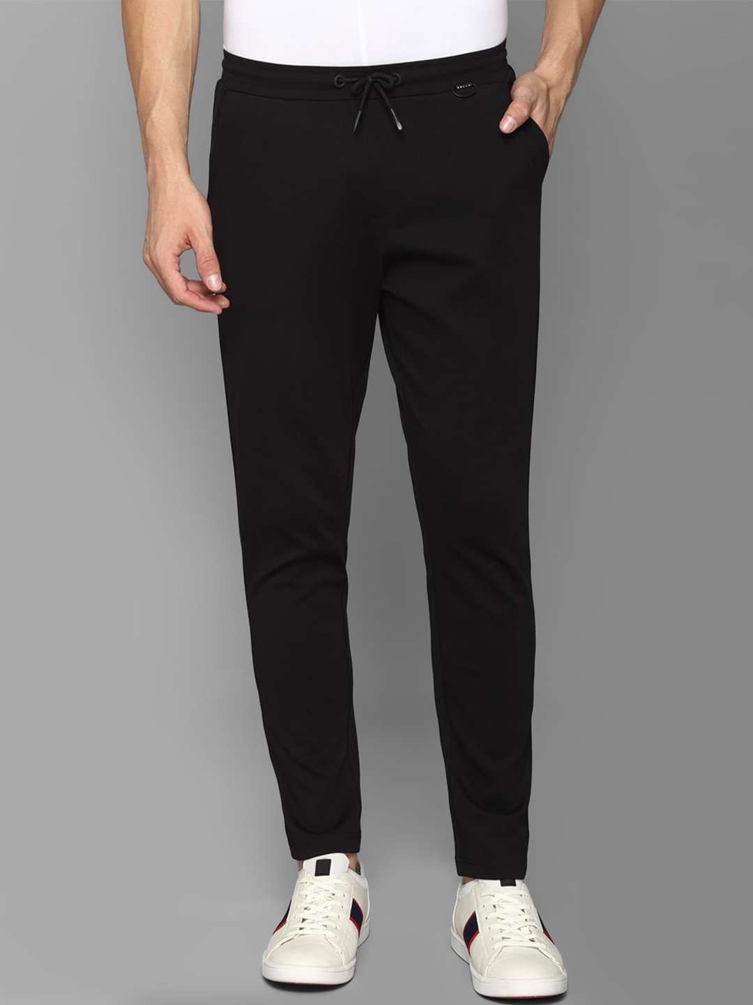 

Allen Solly Tribe Men Black Solid Track Pants