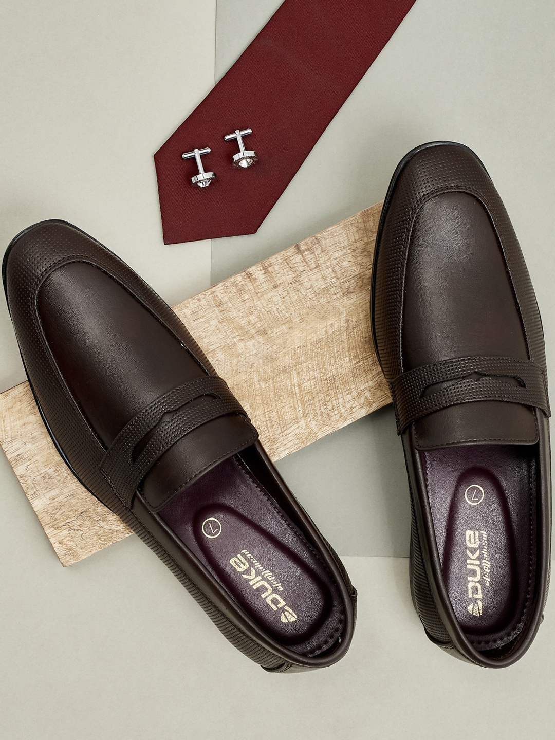 

Duke Men Brown Solid Formal Loafers