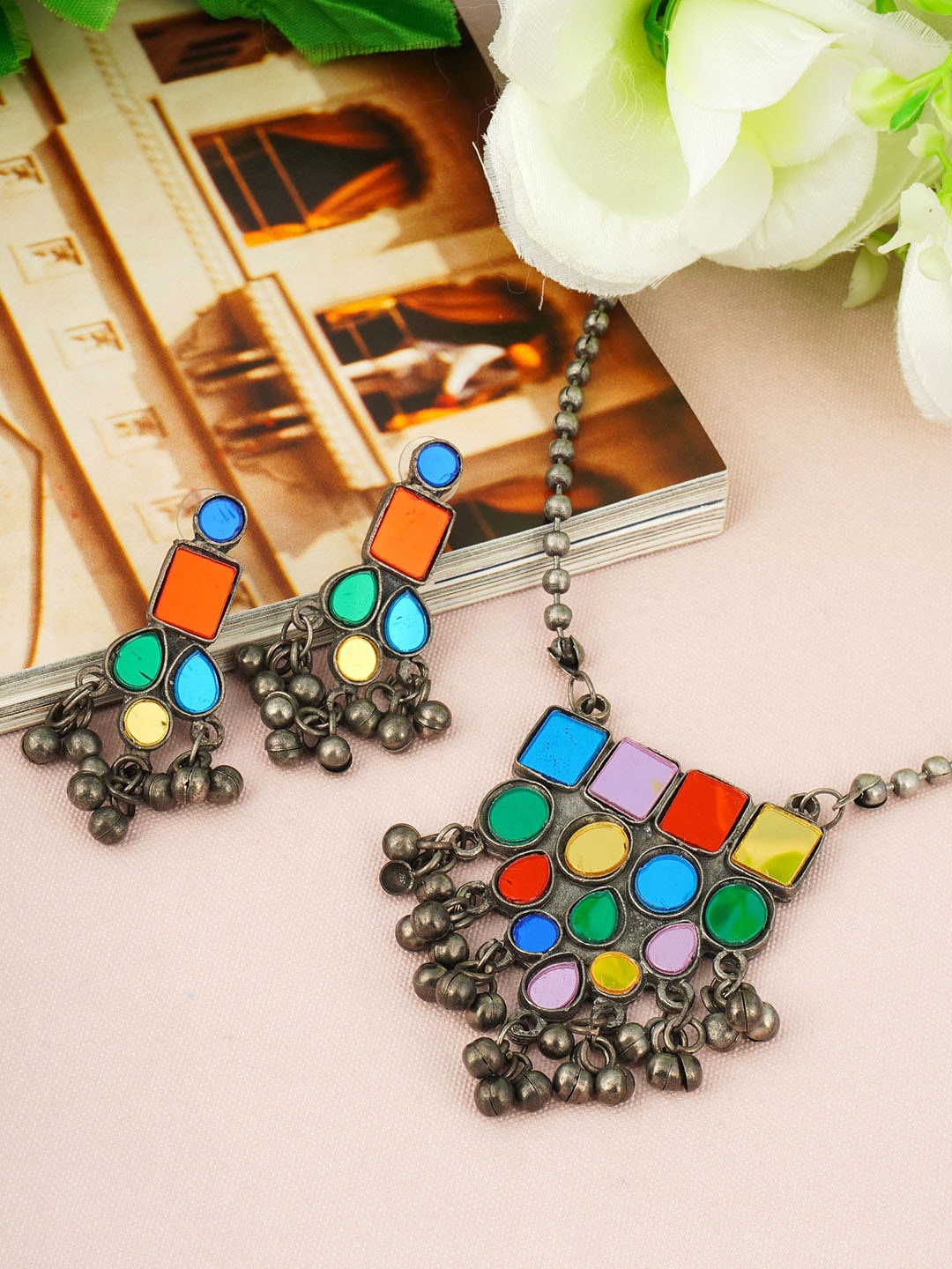 

Urmika Silver-Toned Stone Studded & Beaded Jewellery Set