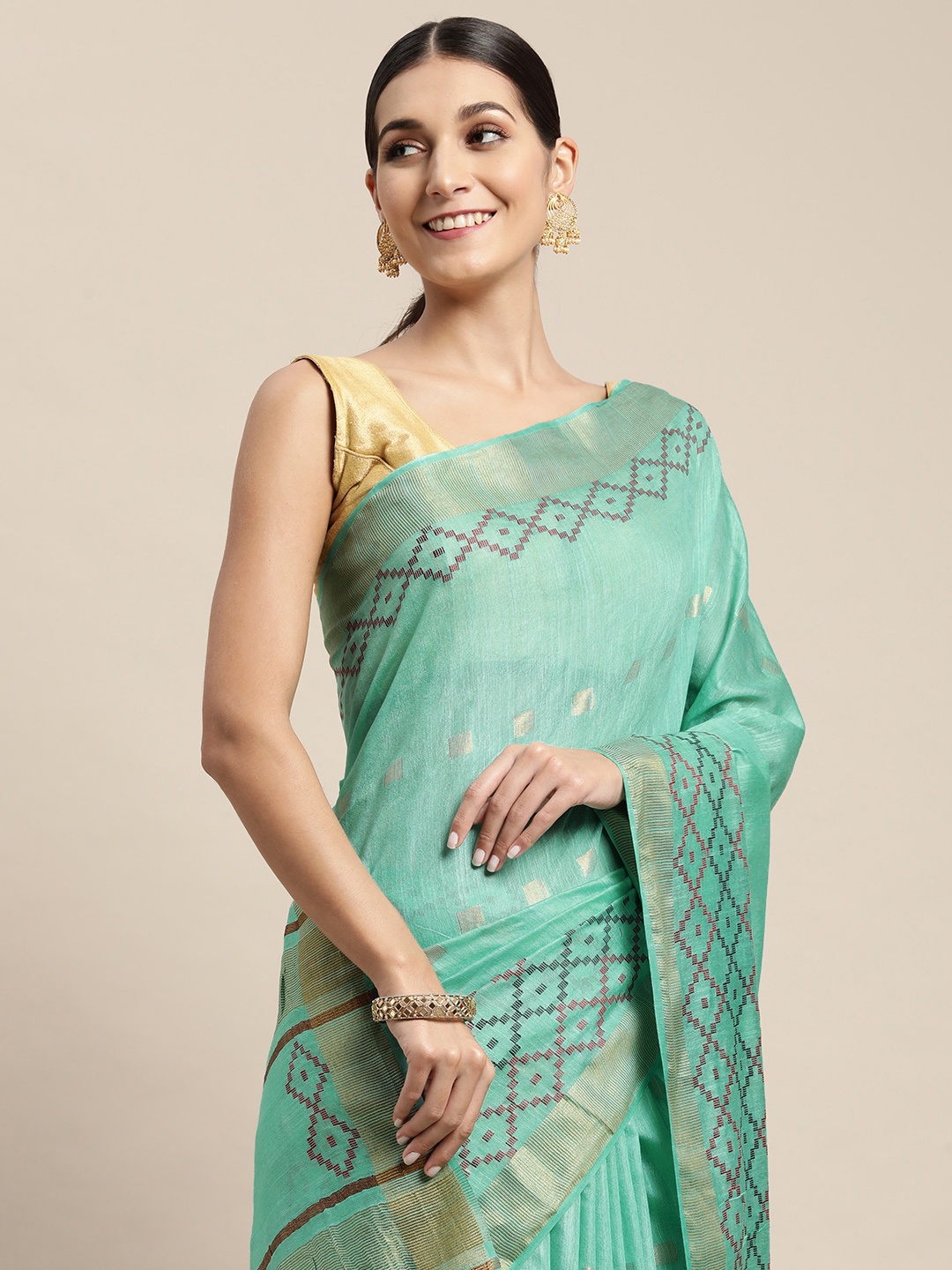 

swatika Sea Green & Golden Geometric Woven Design Bhagalpuri Saree