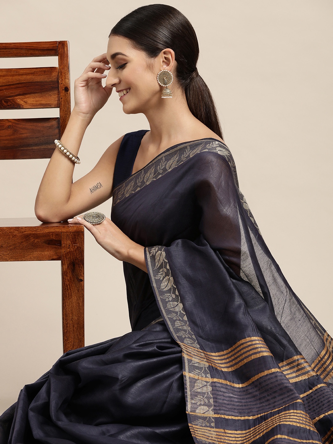 

swatika Blue & Golden Woven Border Pure Silk Bhagalpuri Saree