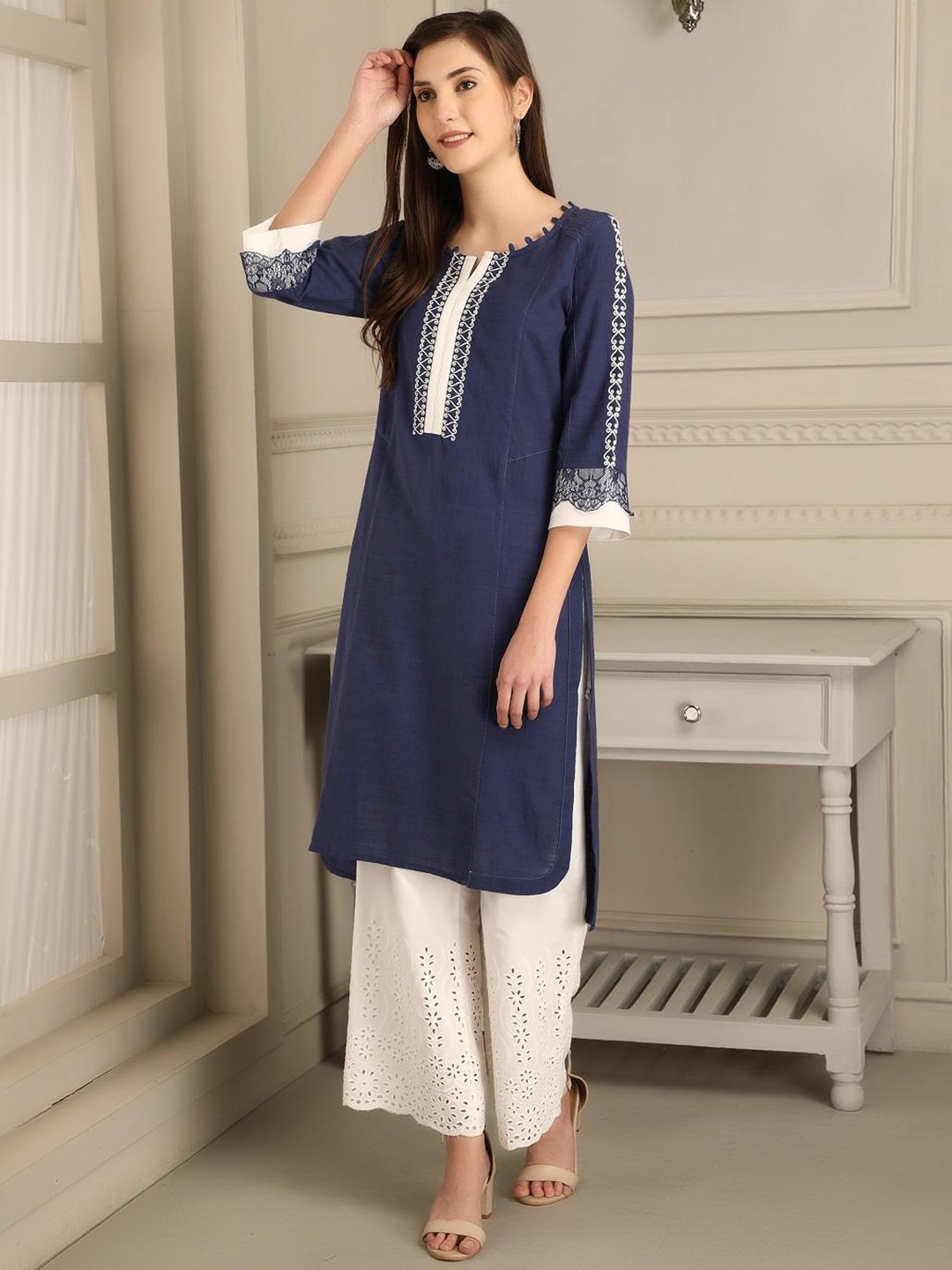 

Lakshita Women Blue & Off White Yoke Design Thread Work Kurta
