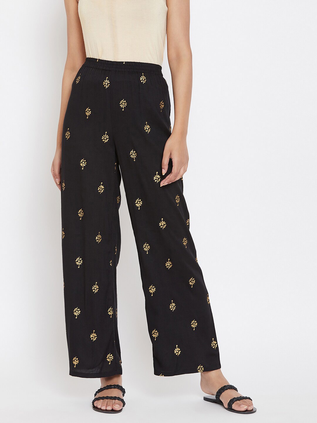 

Evalona Women Black & Gold-Toned Floral Printed Knitted Ethnic Palazzos