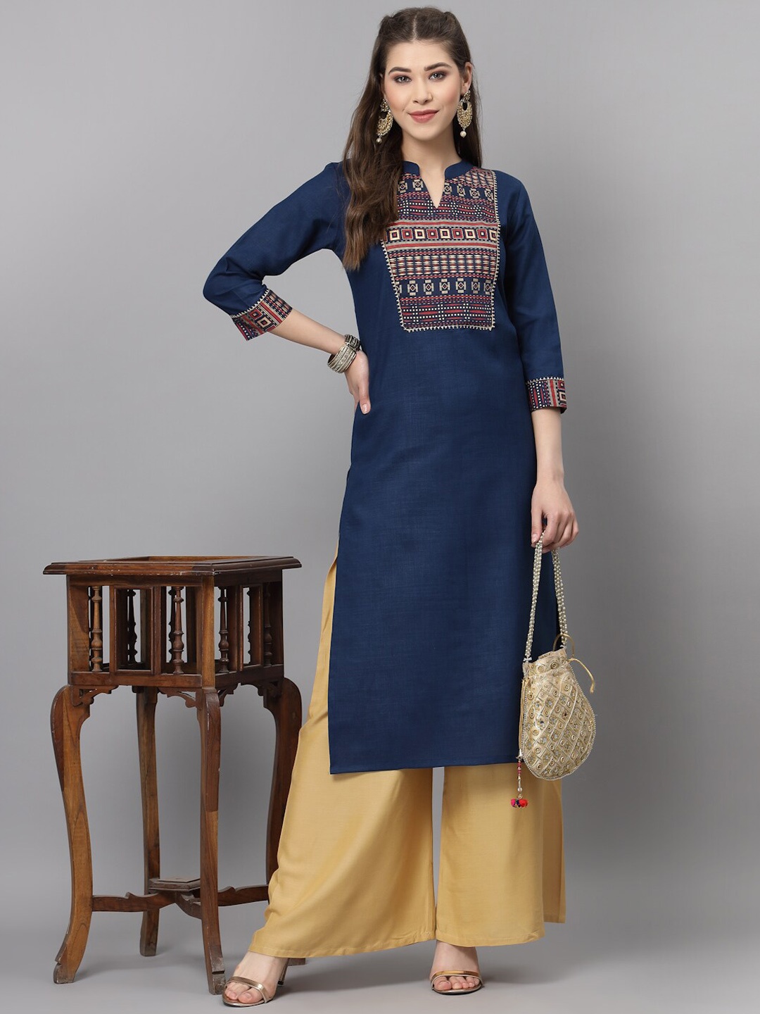 

KALINI Women Teal Ethnic Motifs Yoke Design Kurta