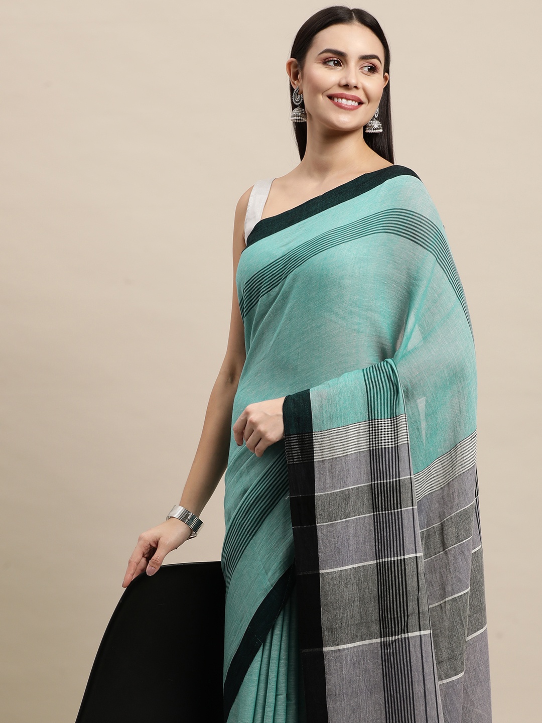 

ArtEastri Green & Black Striped Pure Cotton Saree