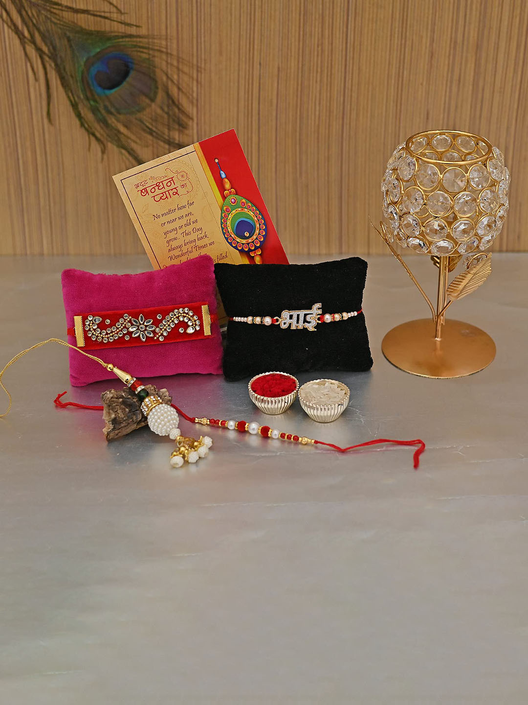 

CraftVatika Set Of 4 Multicoloured Rakhis With Crystal Rose Candle Holder & Greeting Card, Multi