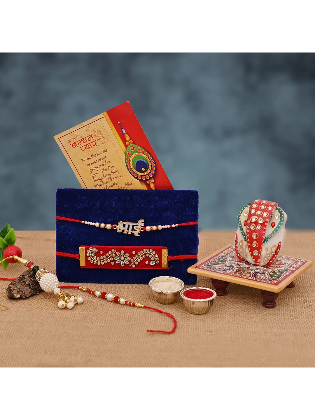 

CraftVatika Gold-Toned & White Rakhi Combo Ganesha with Chowki Greeting Card
