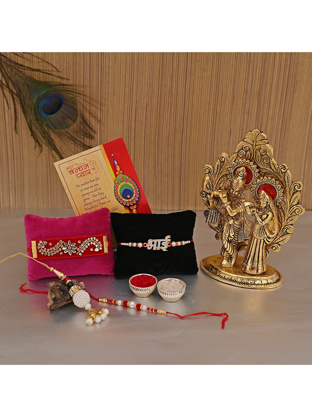 

CraftVatika Set Of 4 Red & Gold-Toned Rakhi, Greeting Card & Radha Krishna Idol