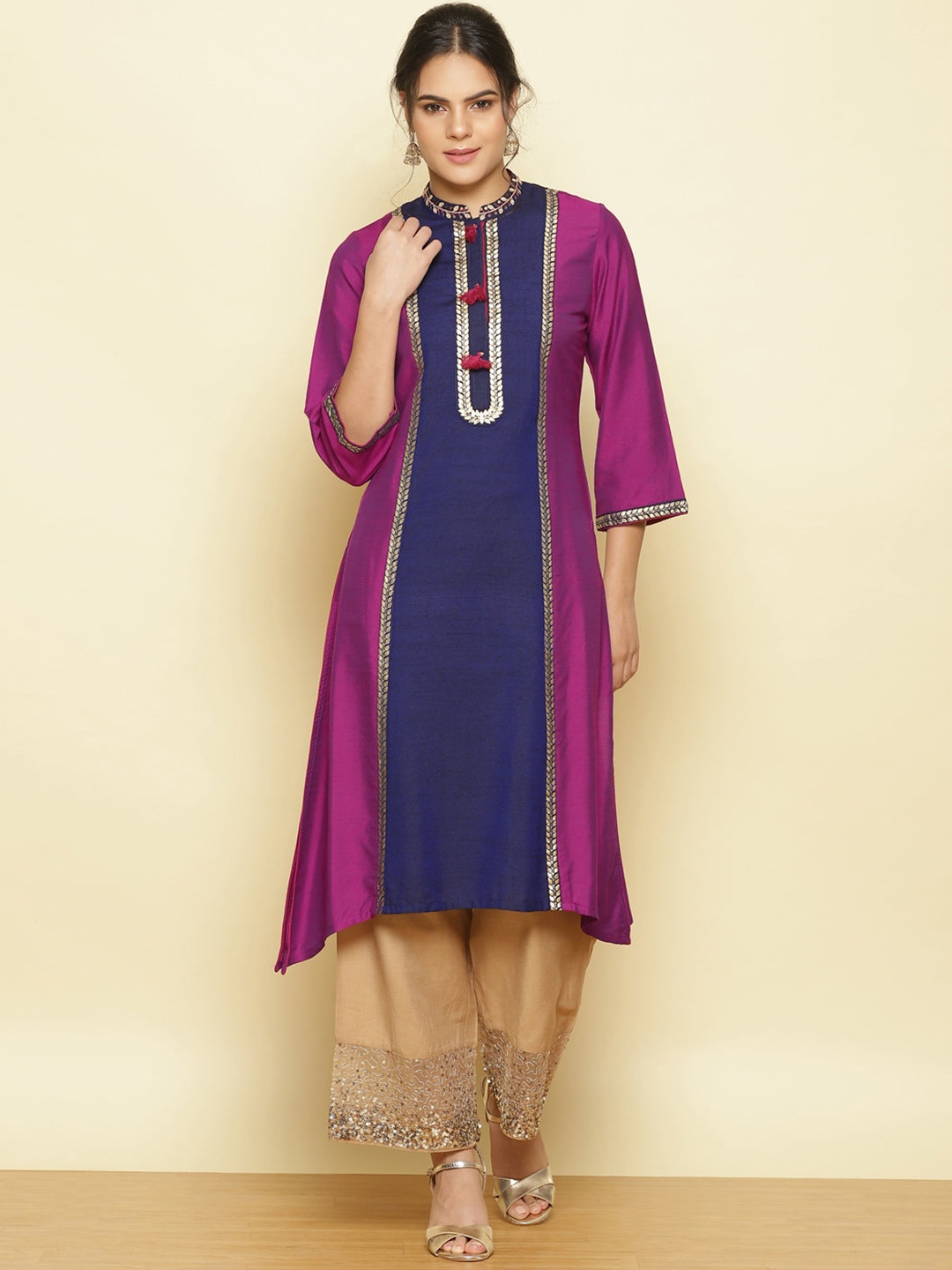 

Lakshita Women's Burgundy Embroidered Flared Sleeves Kurta