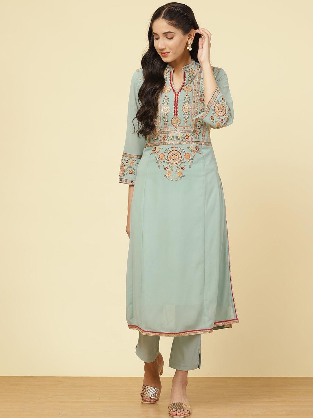 

Lakshita Women's Olive Green Yoke Design Flared Sleeves Gotta Patti Georgette Kurta