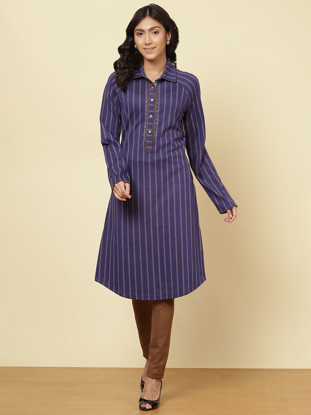 

Lakshita Women's Blue Striped Flared Sleeves Thread Work Kurti