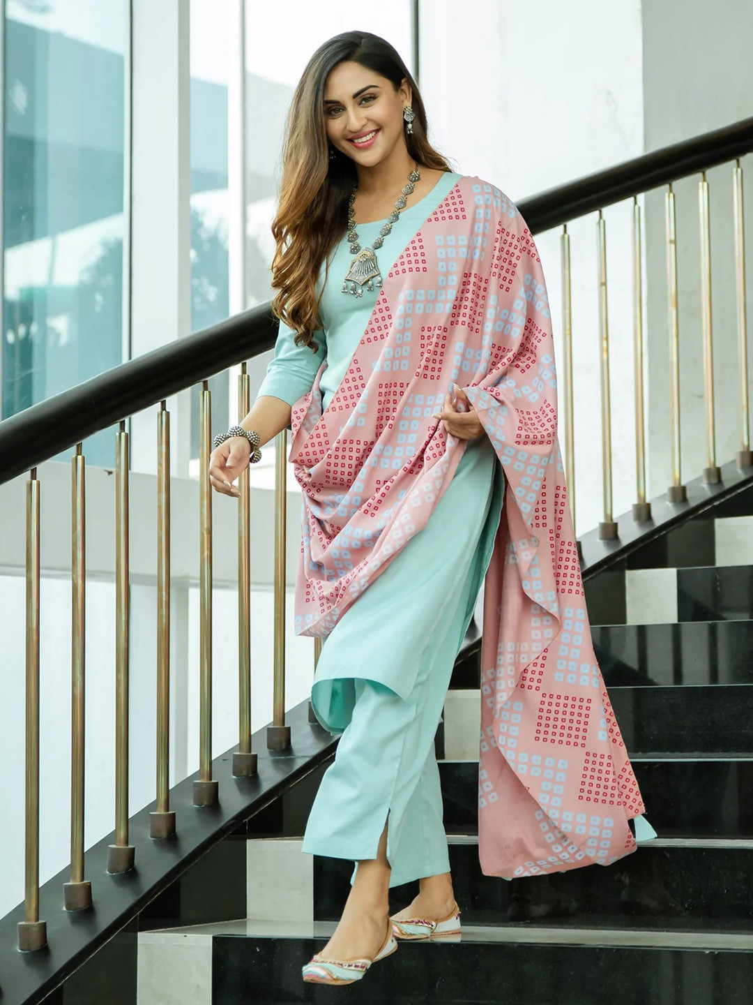 

Rustorange Women Turquoise Blue Printed Kurta with Trousers & With Dupatta