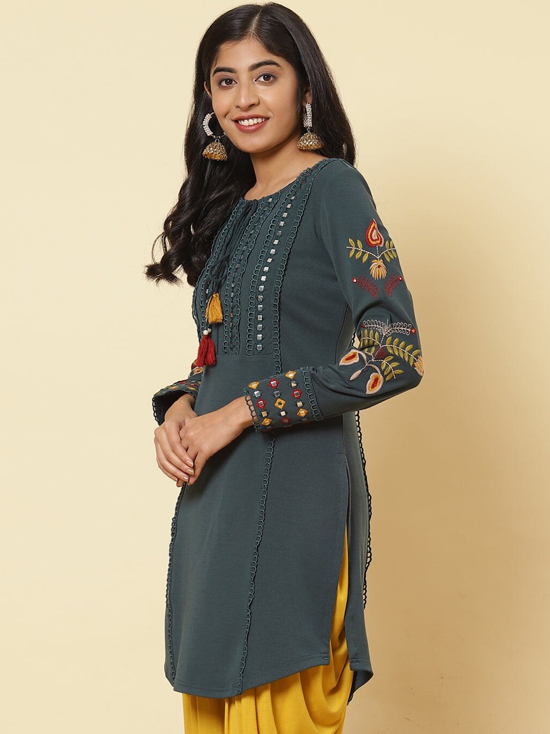 

Lakshita Women Green Floral Embroidered Mirror Work Kurta