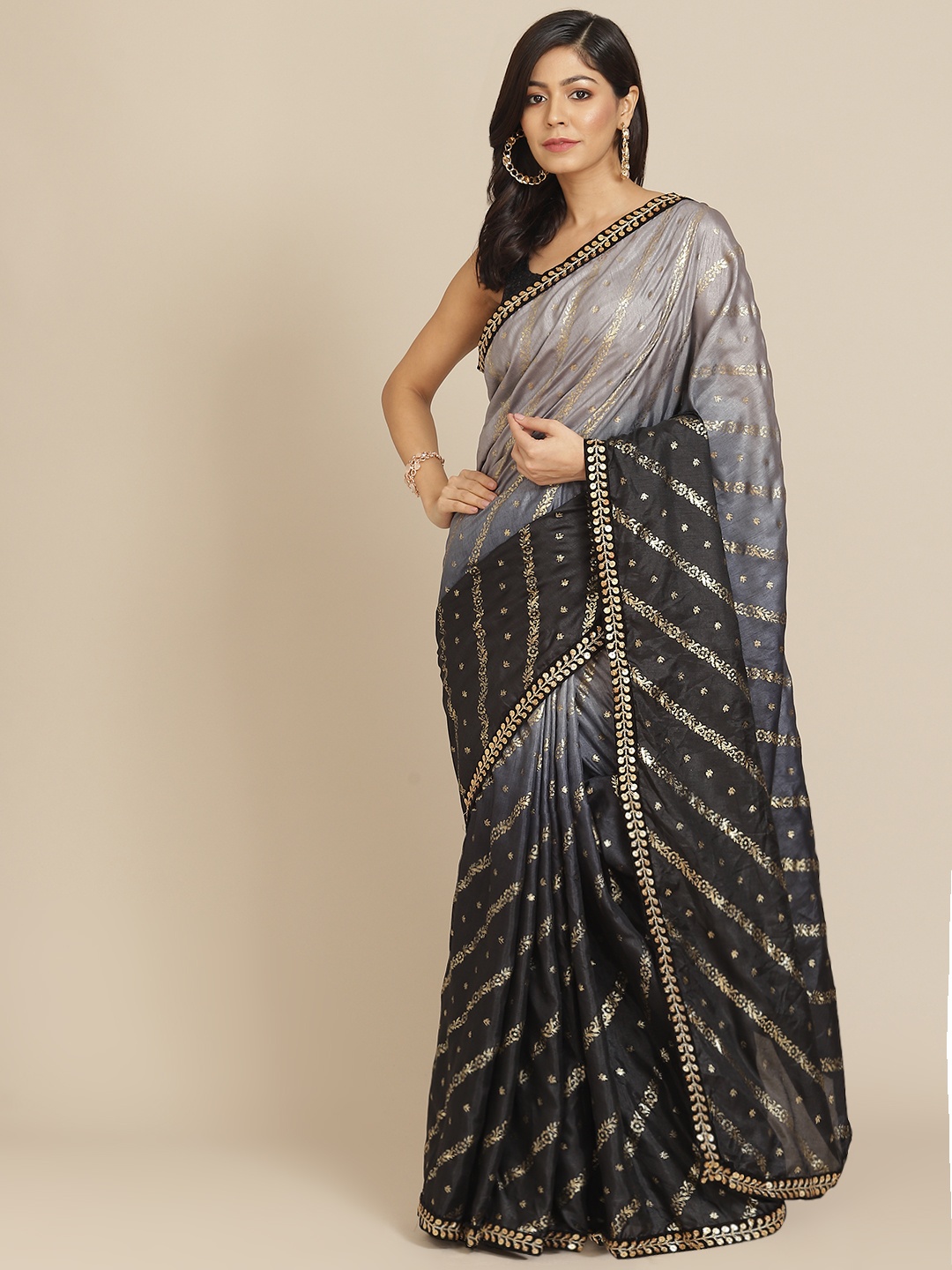 

Tikhi Imli Black Ethnic Motifs Zari Saree