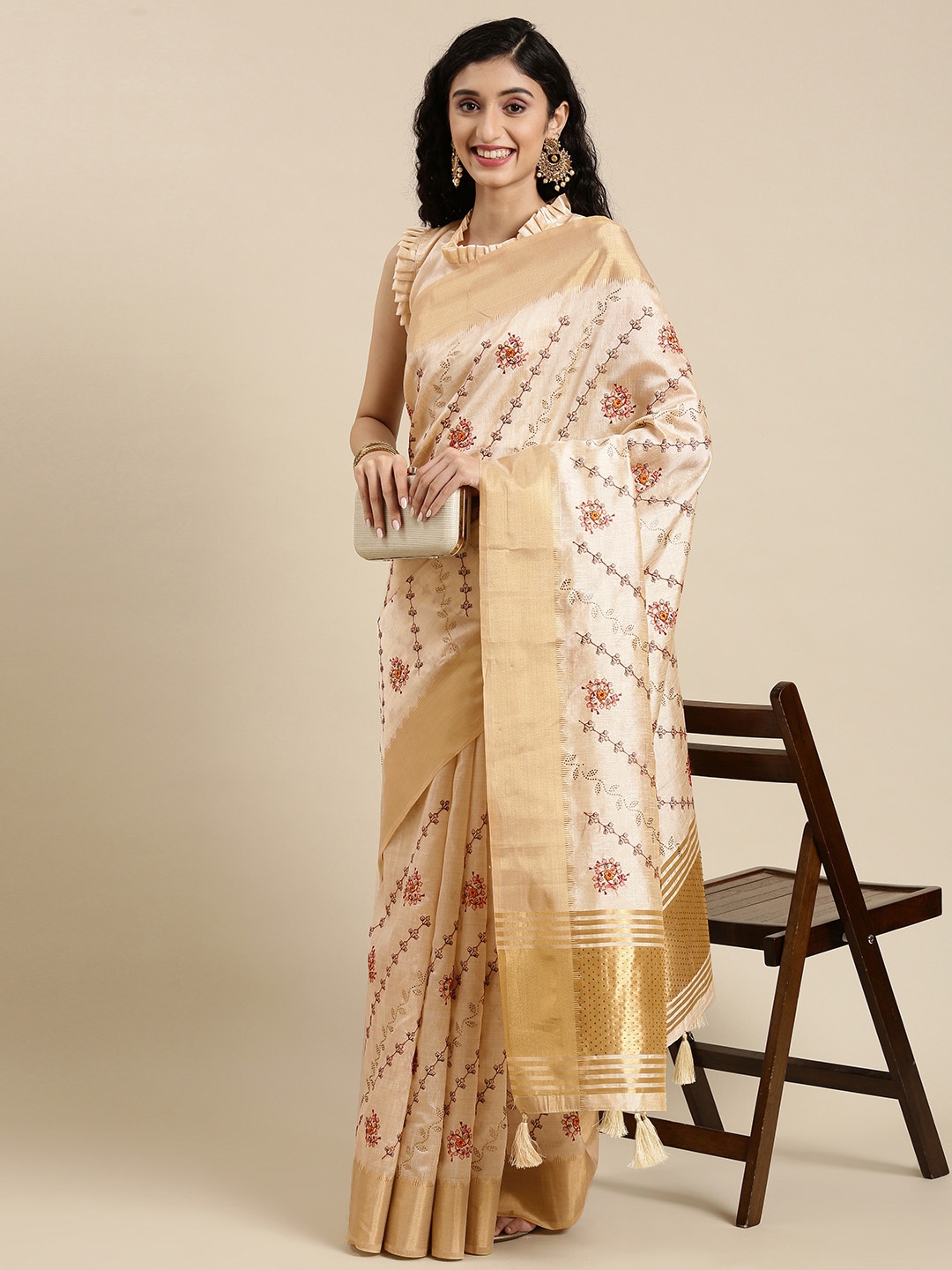 

Mitera Beige & Gold-Toned Ethnic Motifs Saree