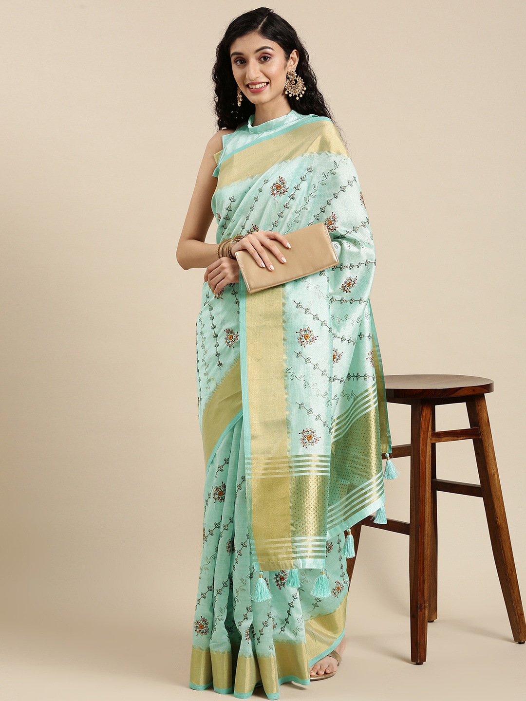 

Mitera Blue & Gold-Toned Ethnic Motifs Saree
