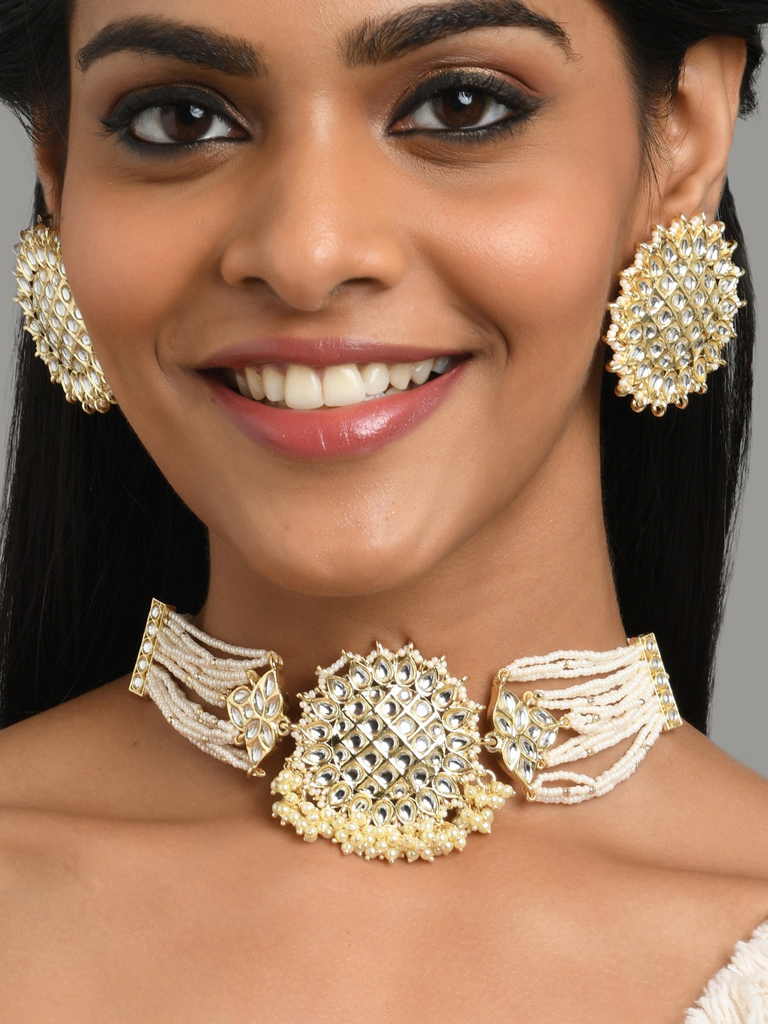 

Fida Gold-Plated White Artificial Stone Studded Choker Jewellery Set