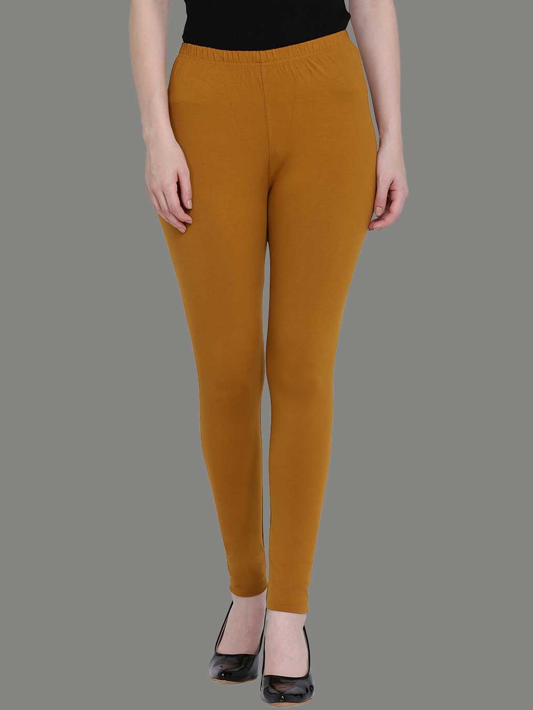 

SPIFFY Women Mustard Solid Full-Length Leggings