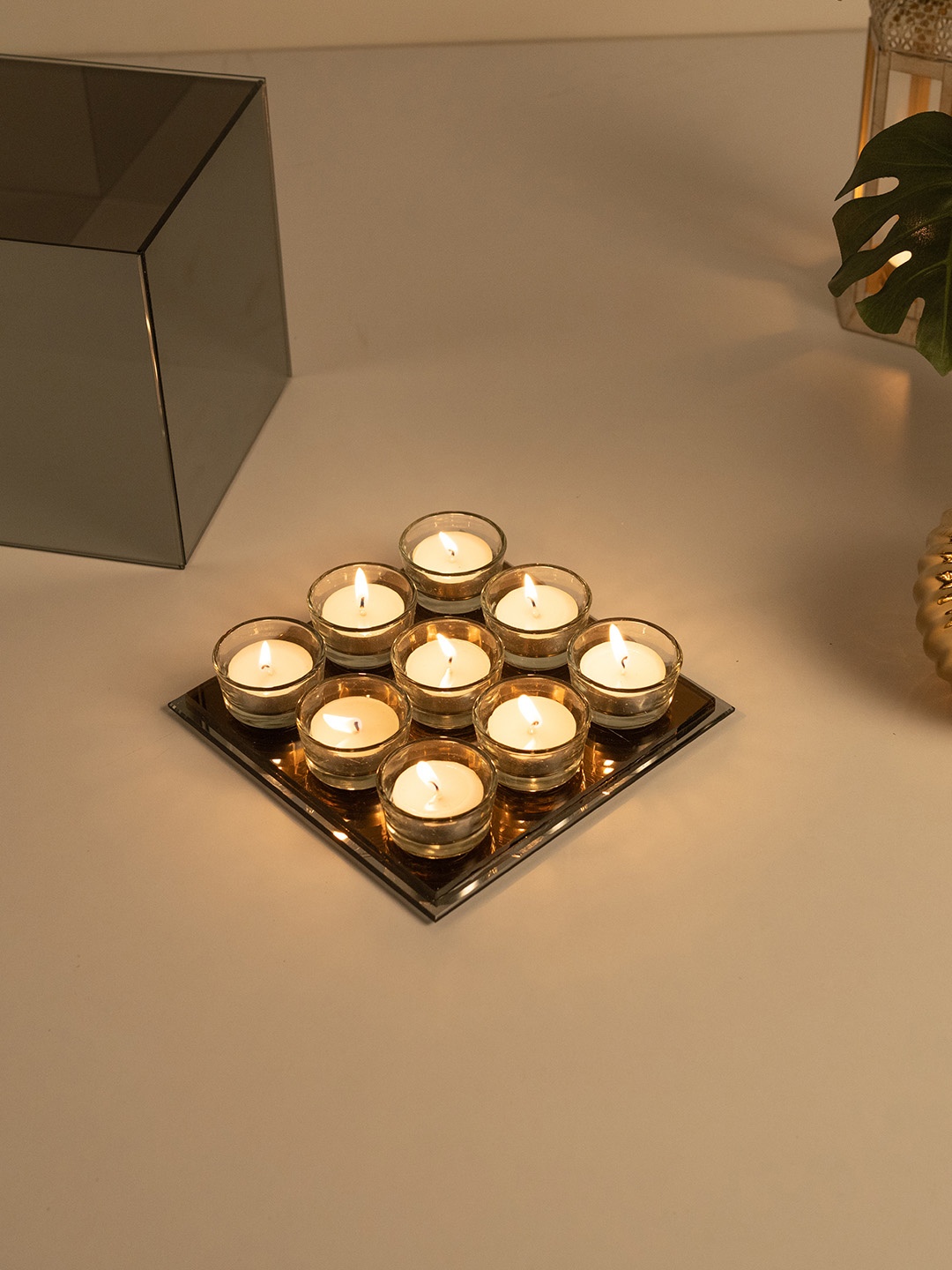 

HomeTown Black Solid Glass Square Shaped Tea Light Candle Holders