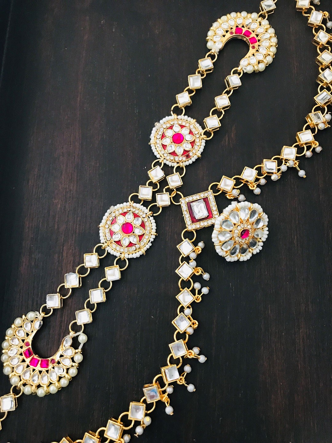 

The Opal Factory Gold-Plated Red Stone-Studded Bridal SheeshPhool
