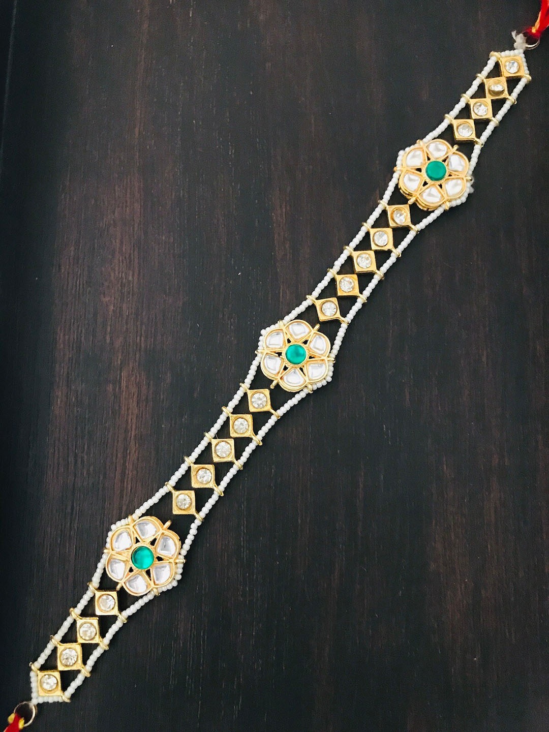 

The Opal Factory Gold-Plated Kundan Studded Mathapati Head Jewellery