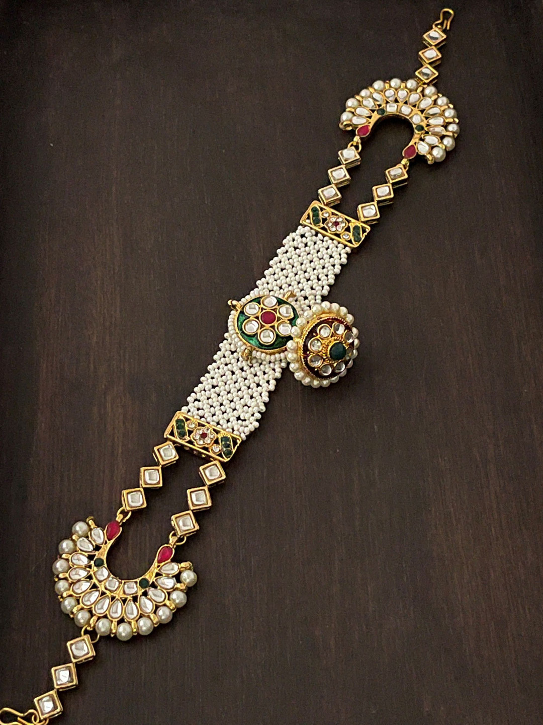 

The Opal Factory Gold-Plated Artificial Stone & Pearl Studded Matha Patti Head Jewellery