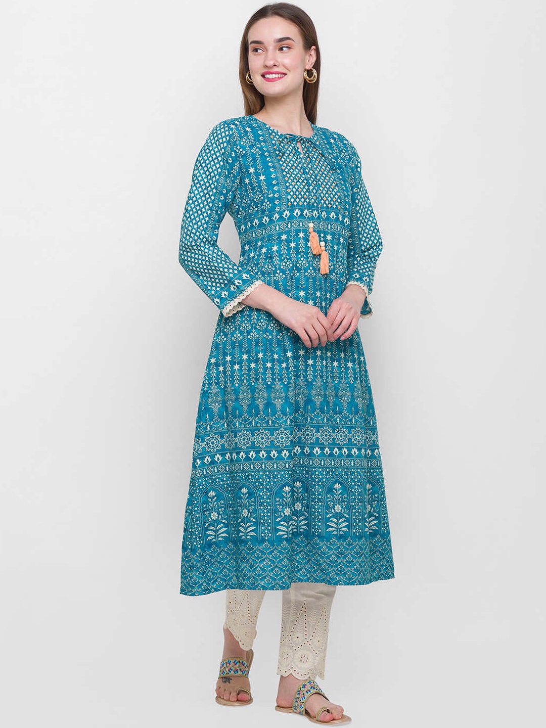 

ZOLA Women Blue Floral Printed Panelled Kurti with Trousers