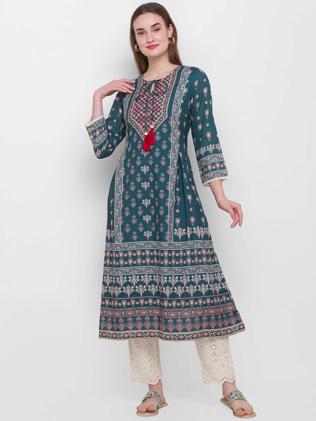 

ZOLA Women Green Ethnic Motifs Panelled Kurti with Trousers