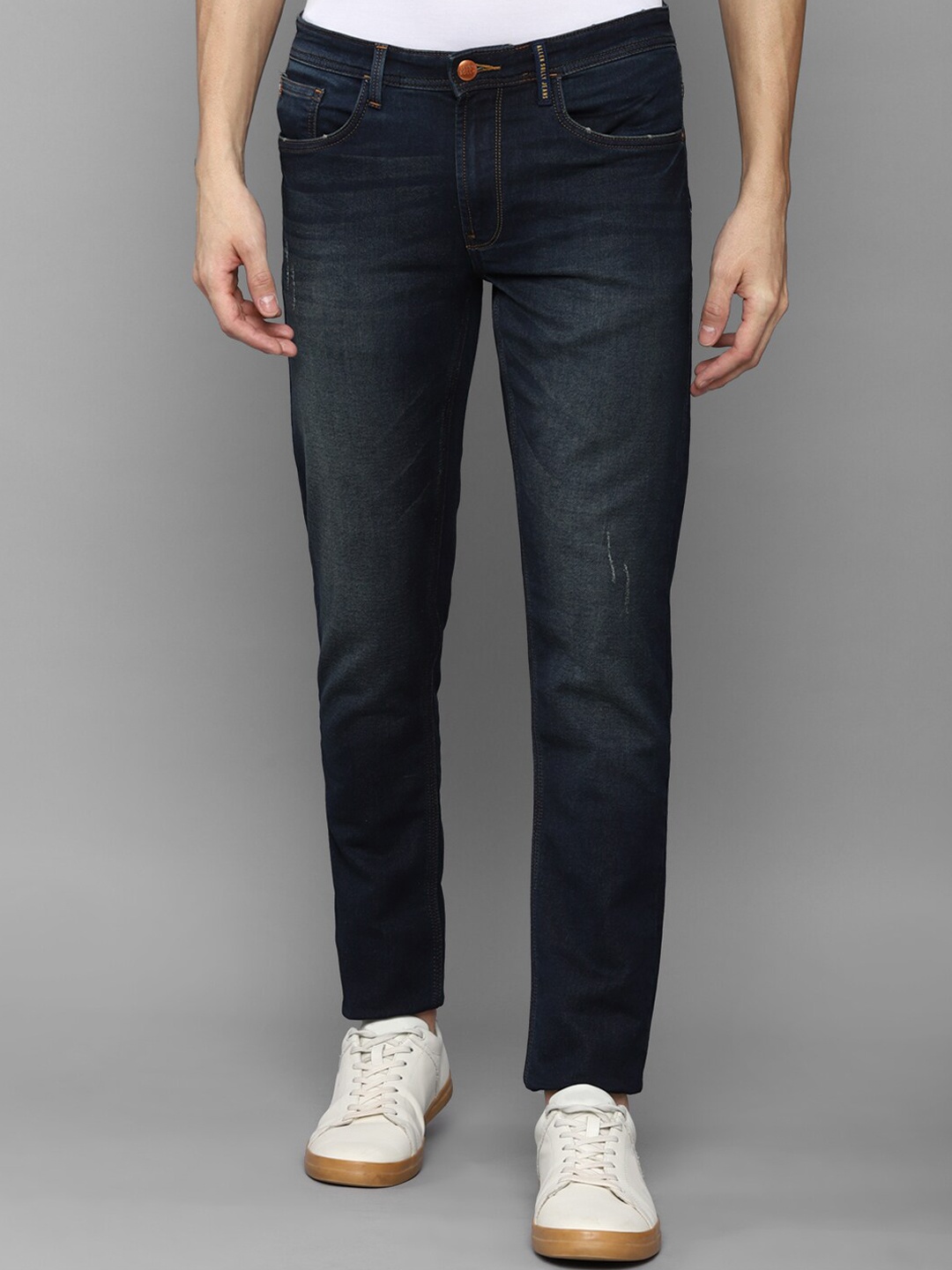 

Allen Solly Sport Men Navy Blue Skinny Fit Low Distress Light Fade Jeans