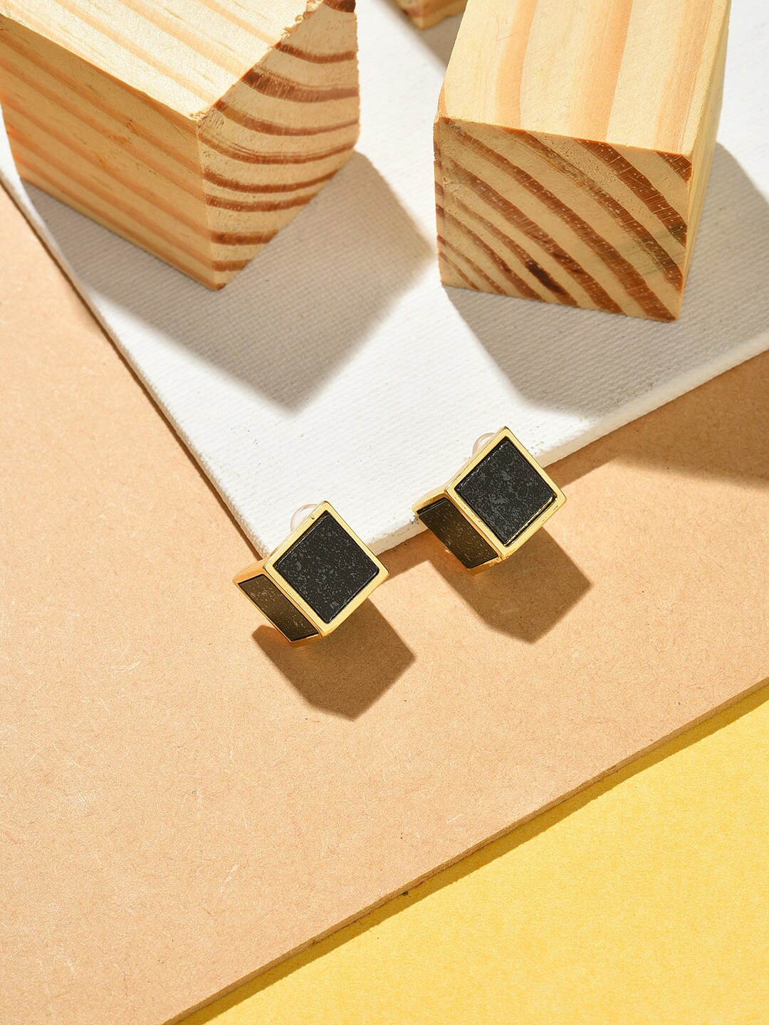 

SOHI Black Contemporary Studs Earrings