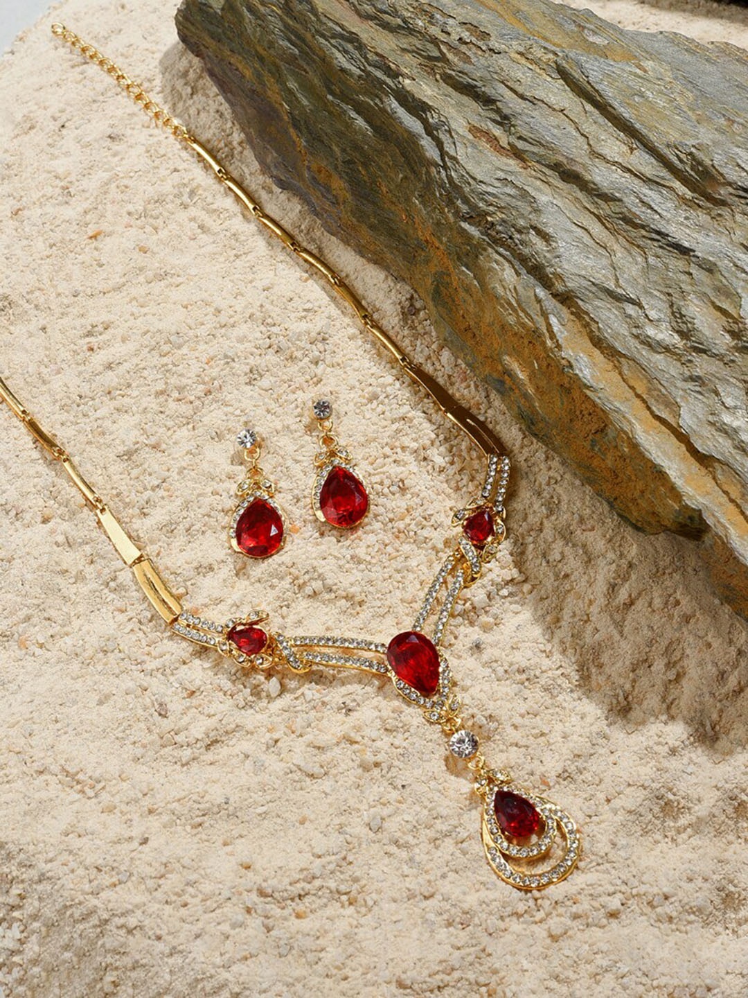 

SOHI Gold Plated Red Colored White Stone Studded Jewellery Set