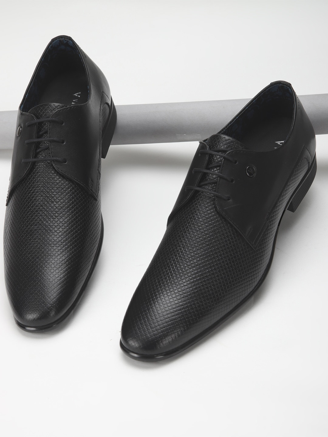 

Van Heusen Men Black Solid Leather Derby Formal Shoes
