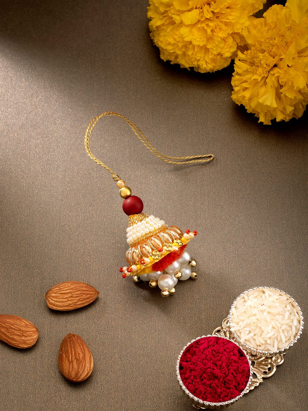 

Peora Lumba Women Gold Beads Studded Dangling Raksha Bandhan Rakhi
