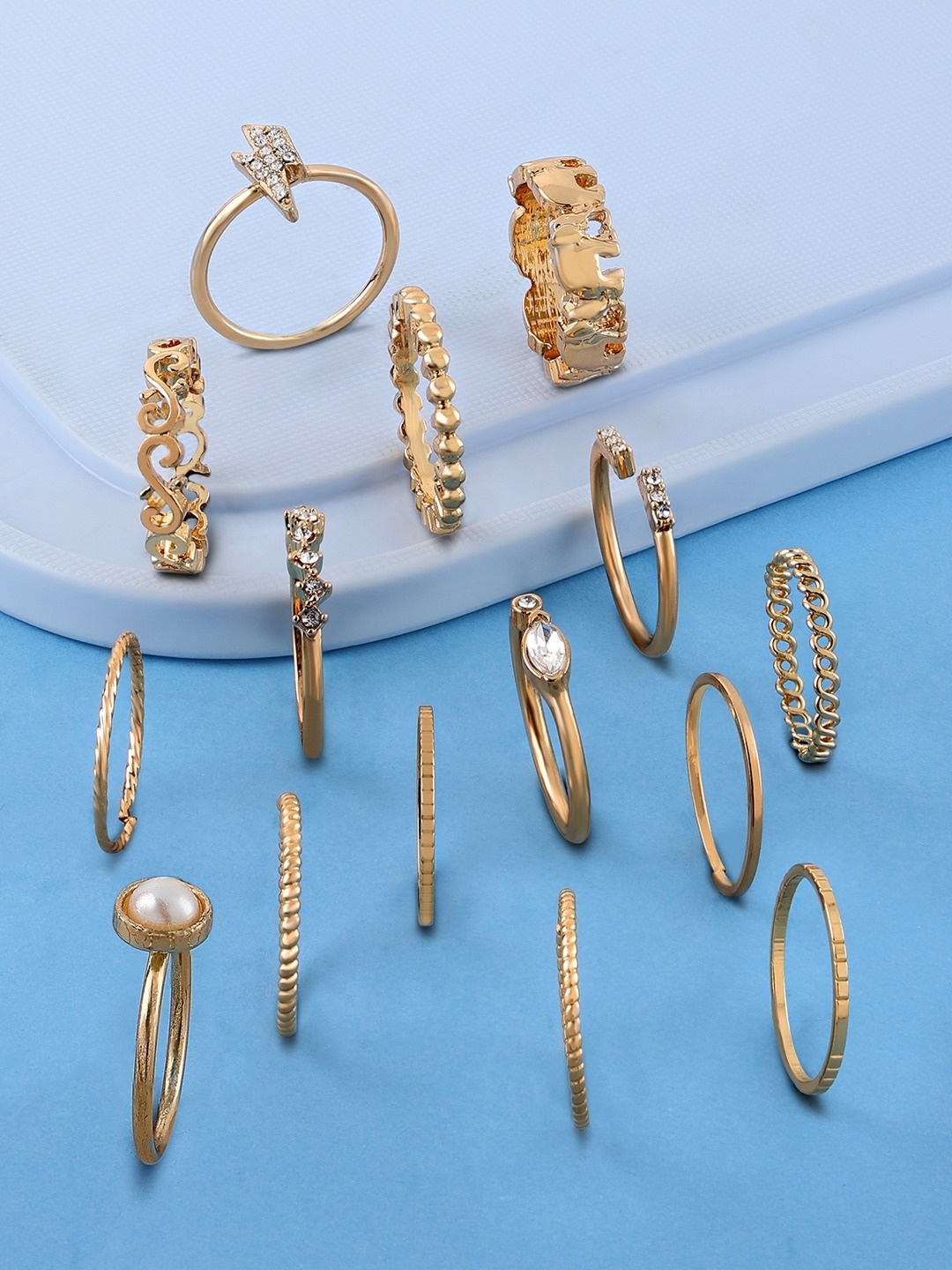 

AMI Set of 15 Gold-Plated White Stone Studded & Beaded Finger Ring