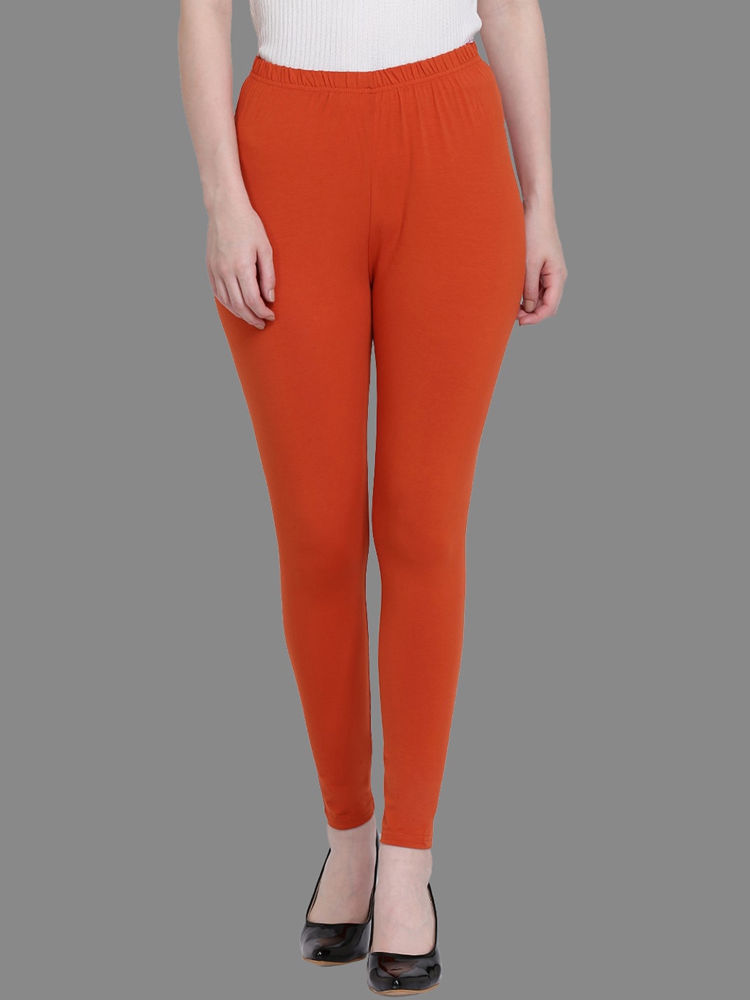 

SPIFFY Women Rust-Orange Solid Ankle-Length Leggings