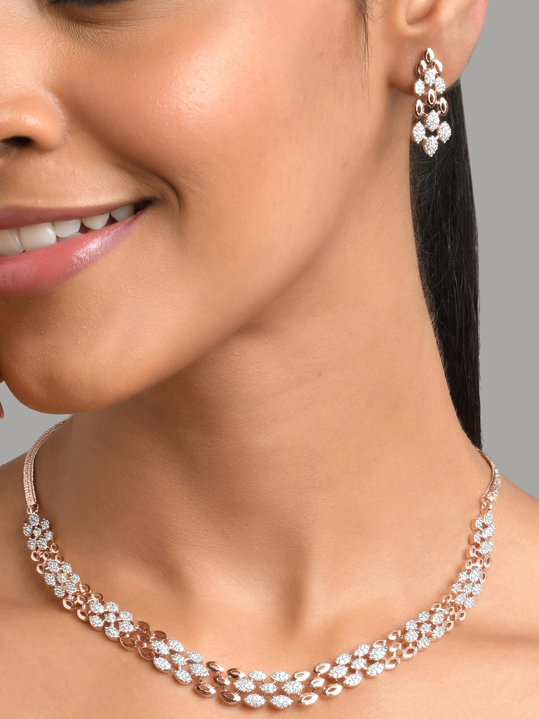 

Fida Rose Gold-Plated White AD-Studded Jewellery Set